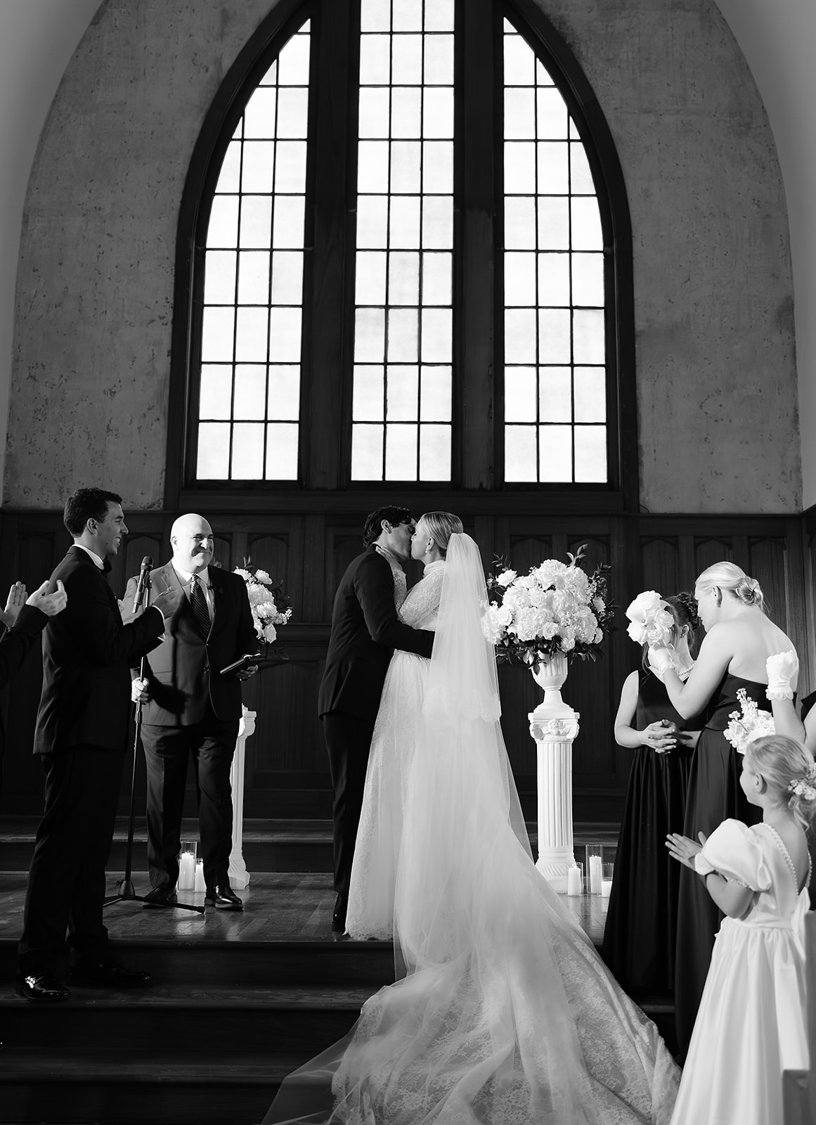 First kiss photo at The Woodland in Phoenix destination wedding. 