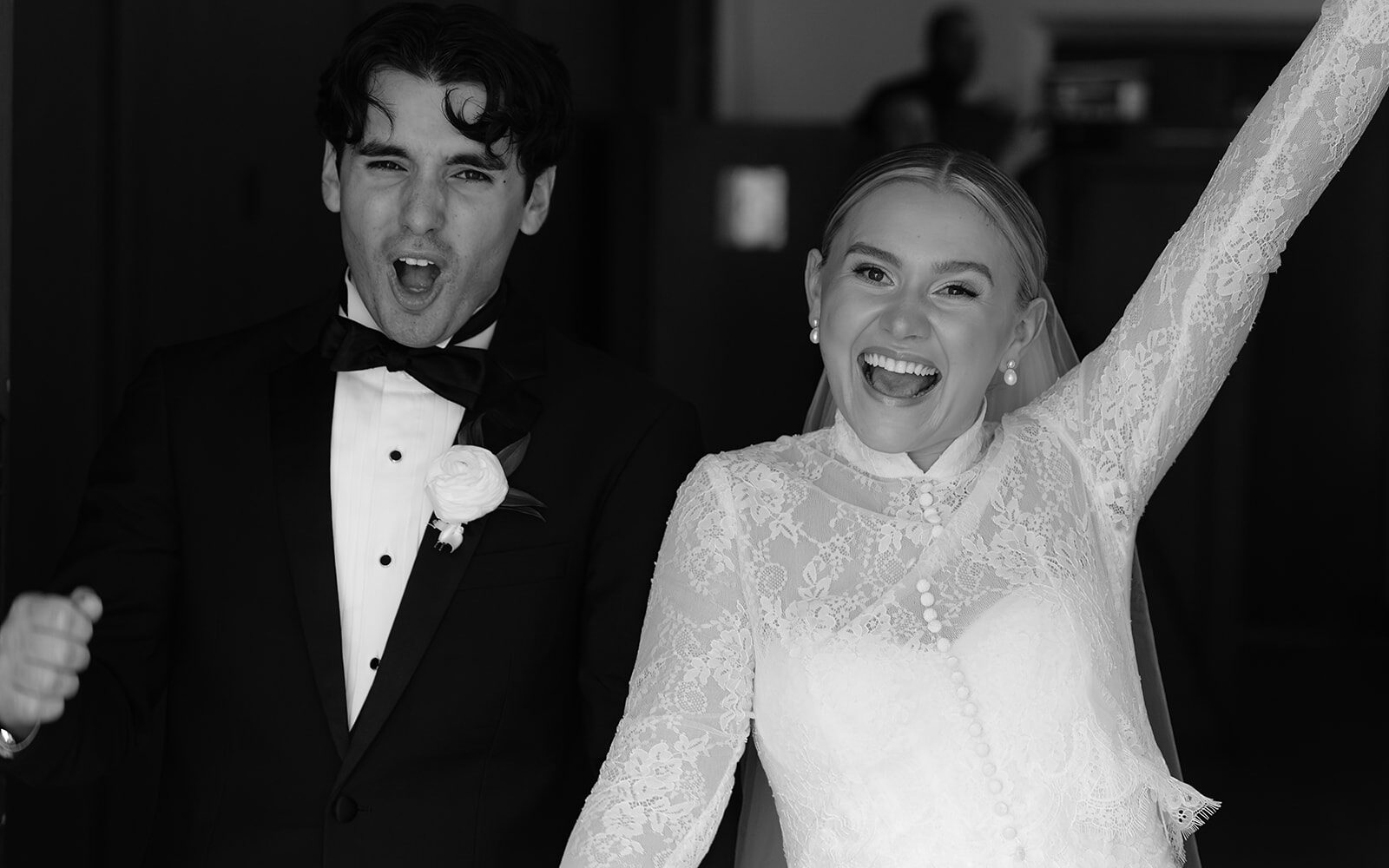 Couple walking out of their wedding ceremony at The Woodland in Phoenix