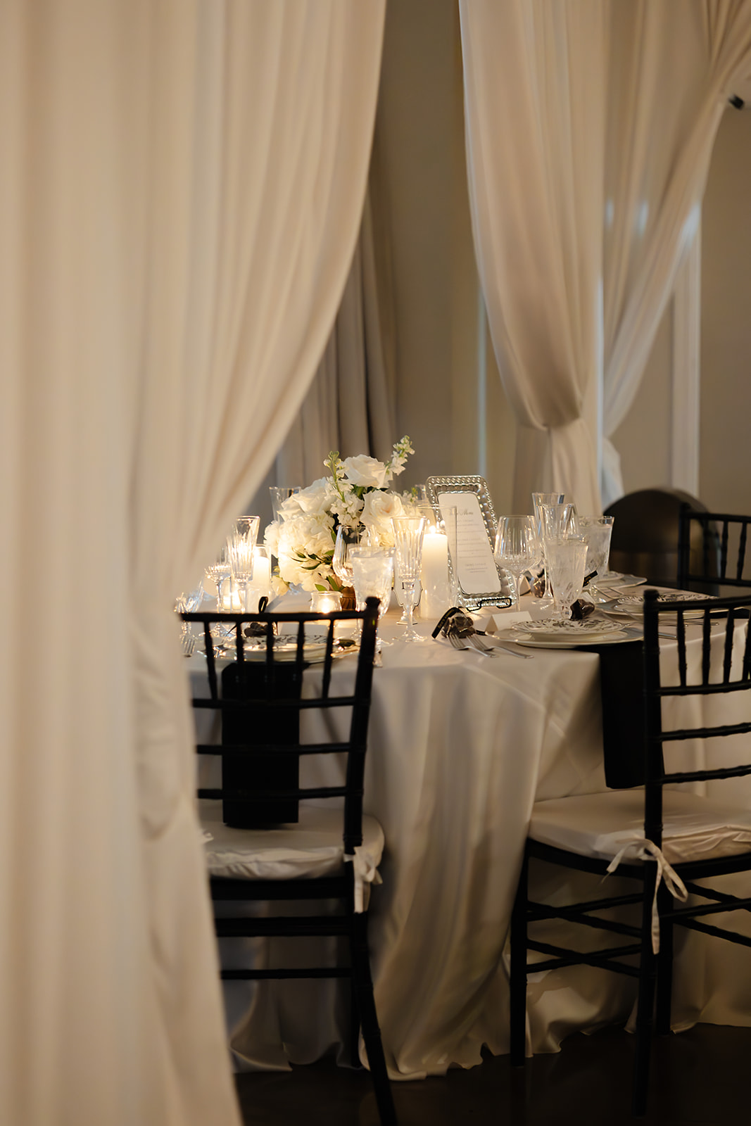 Candlelit wedding reception with black and white dance floor at Phoenix venue
