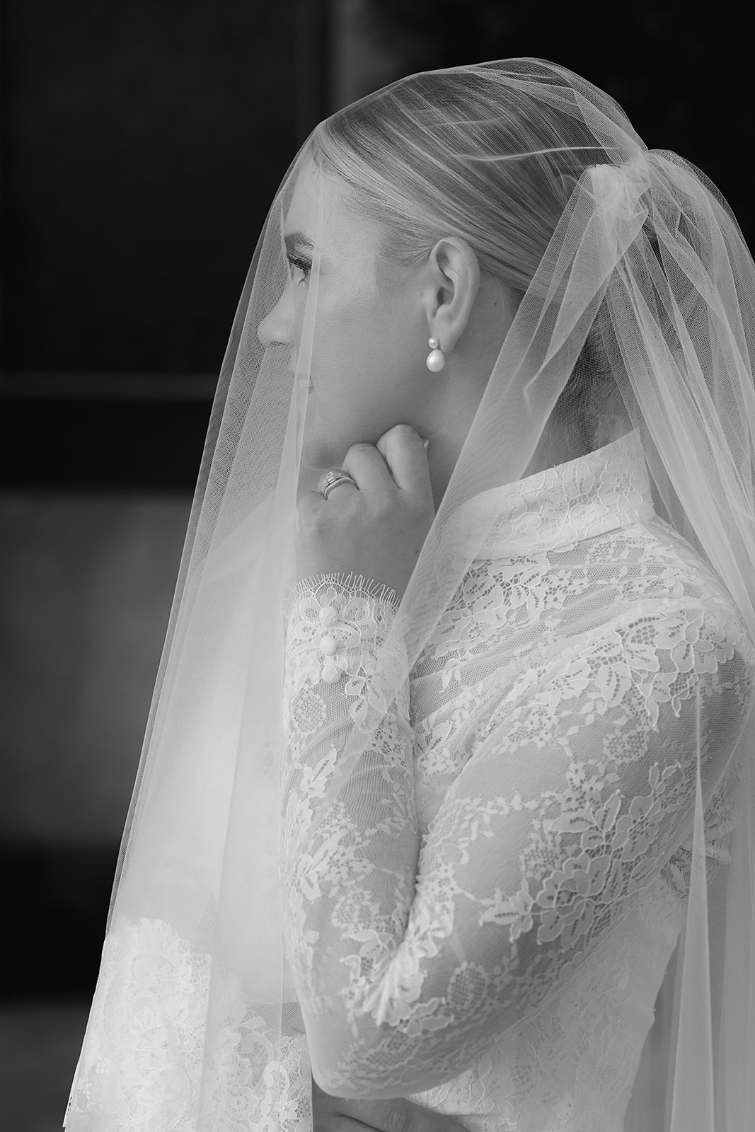 Editorial photo of bride with blusher over her face during sunset photos in Phoenix. 