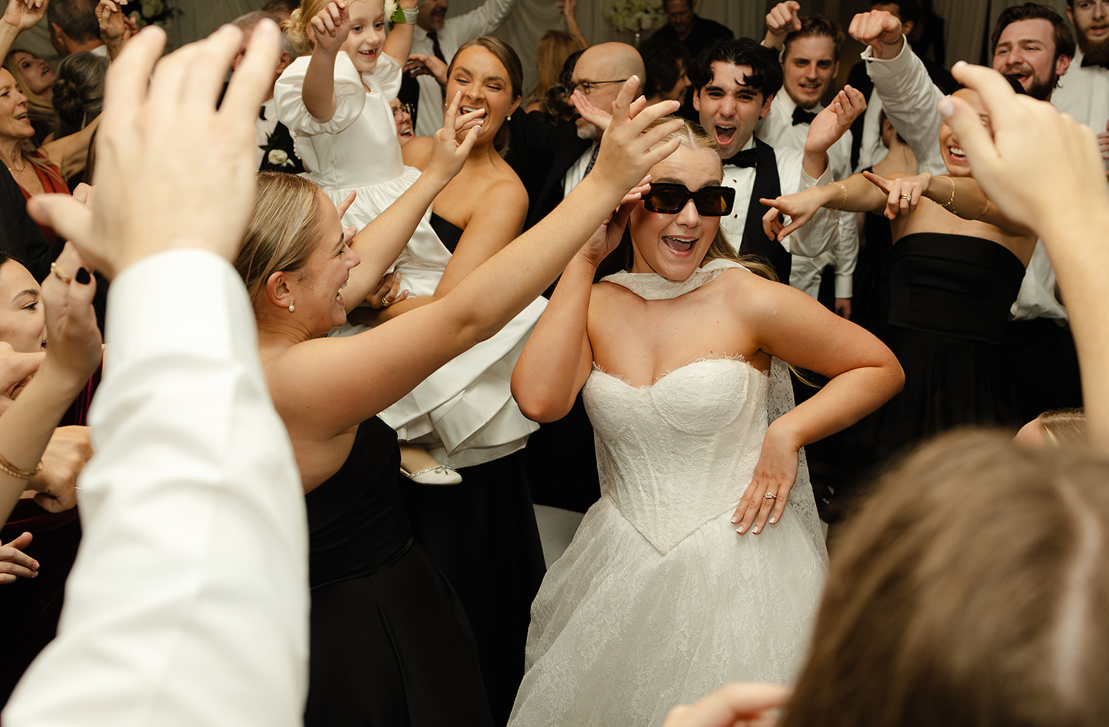 Wedding guests dancing during reception at The Woodlands Phoenix