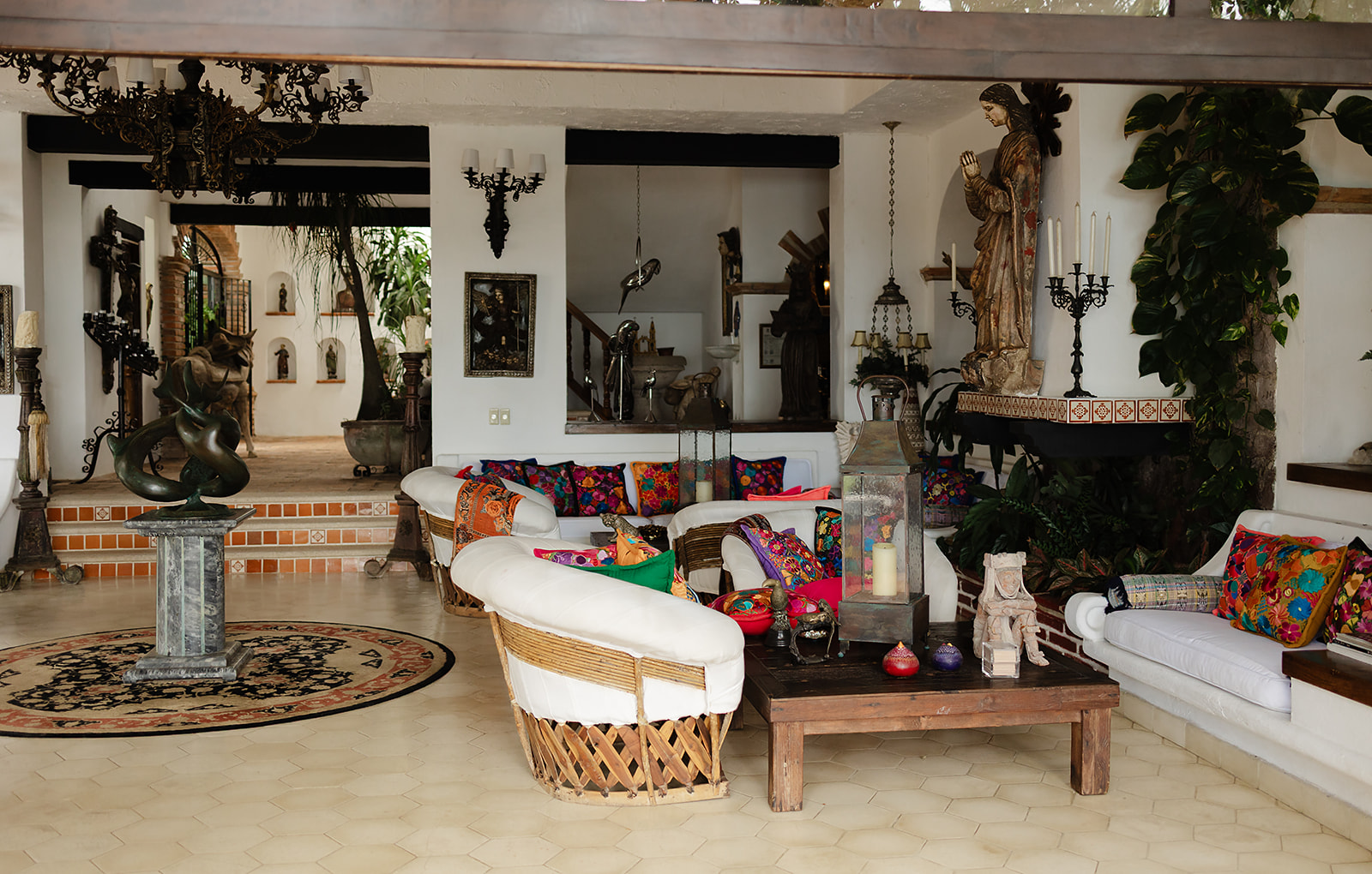 Open-air living space with antique decor at Puerto Vallarta wedding venue