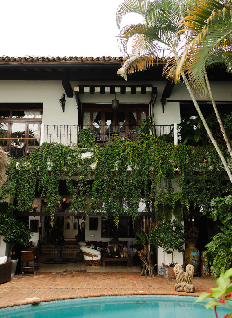 Turquoise pool surrounded by tropical landscape at private villa wedding