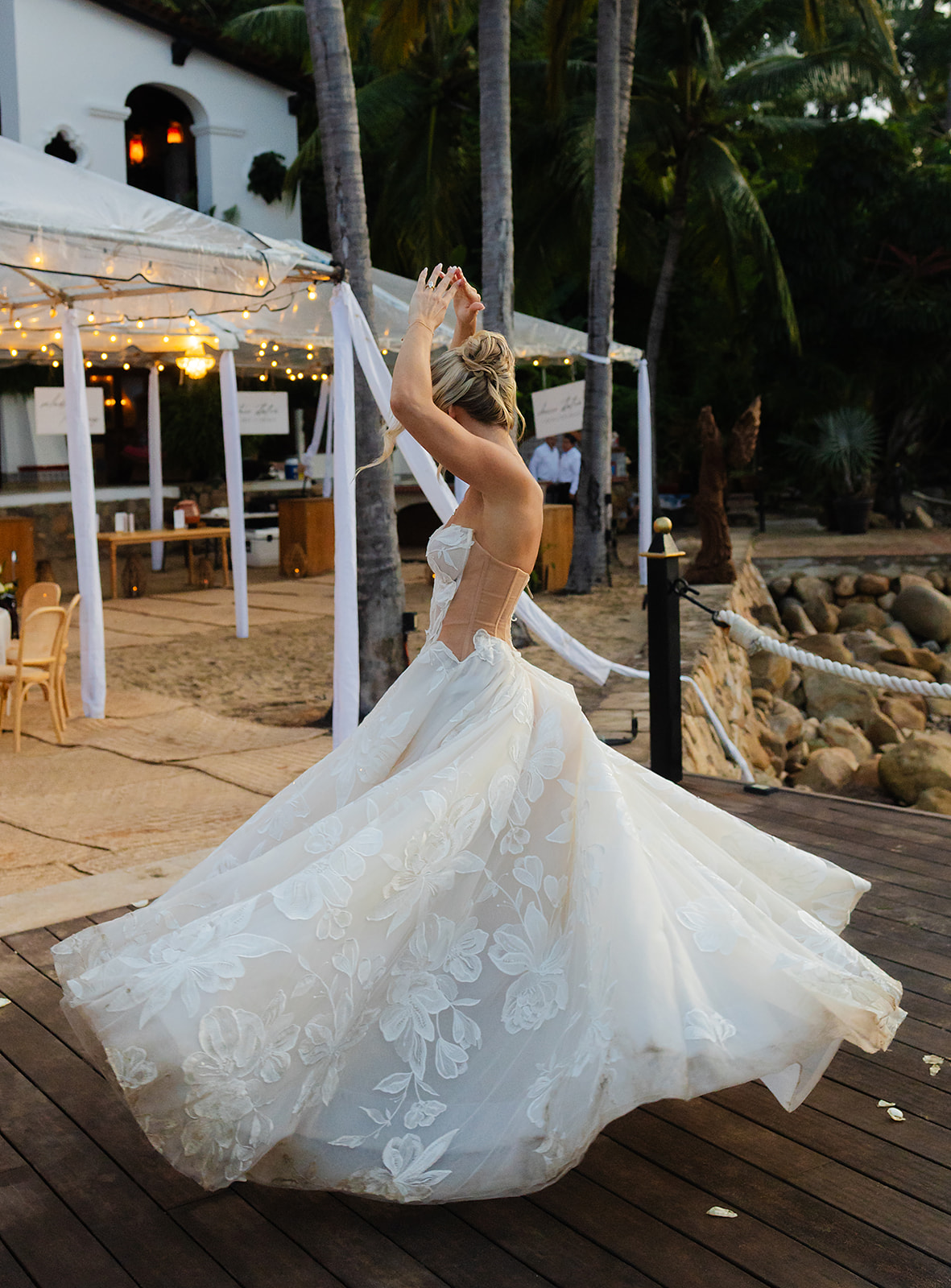 Destination wedding celebration unfolding along rocky Puerto Vallarta coast
