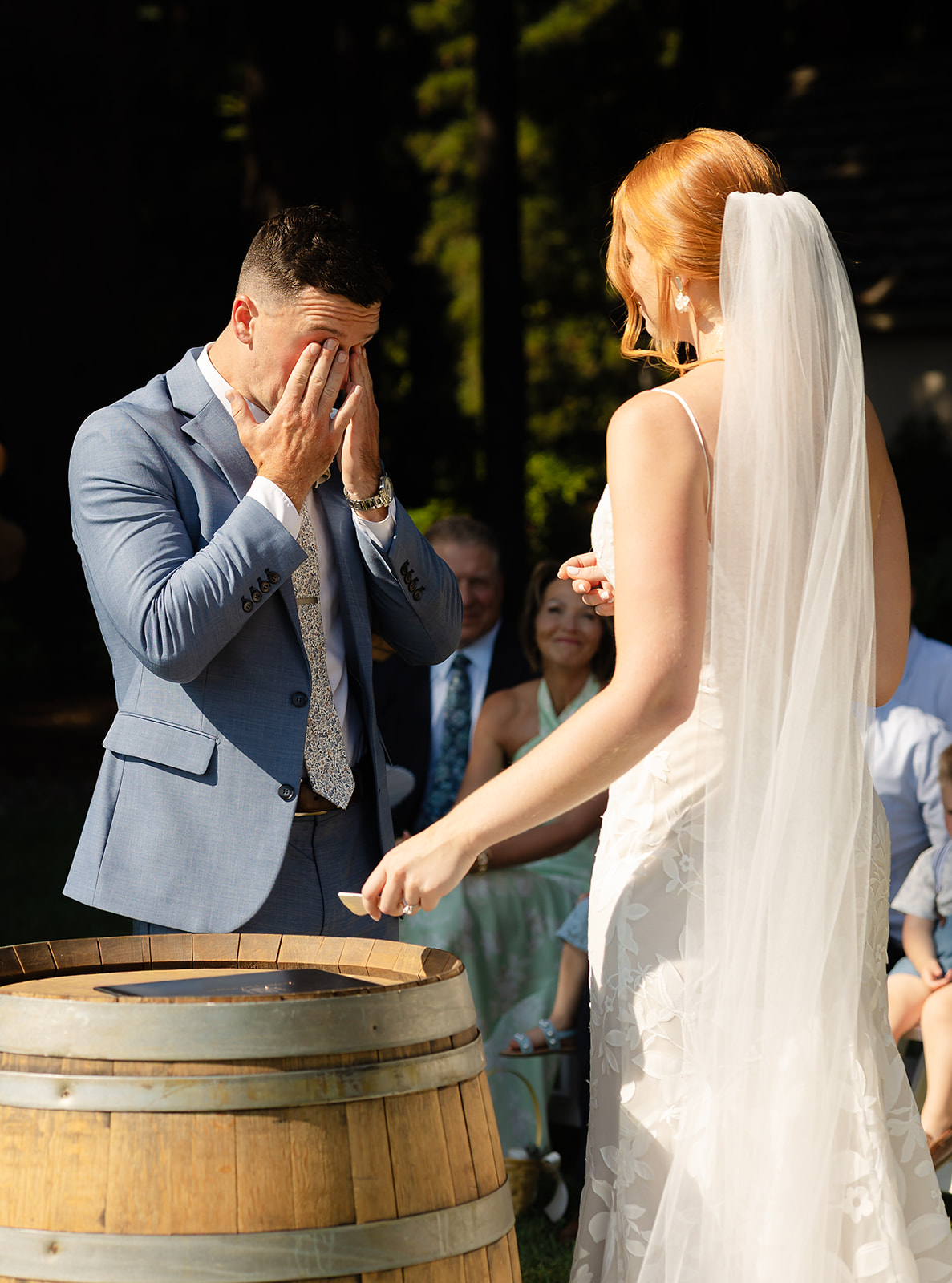 Couple exchanging vows during outdoor ceremony in Napa wine country