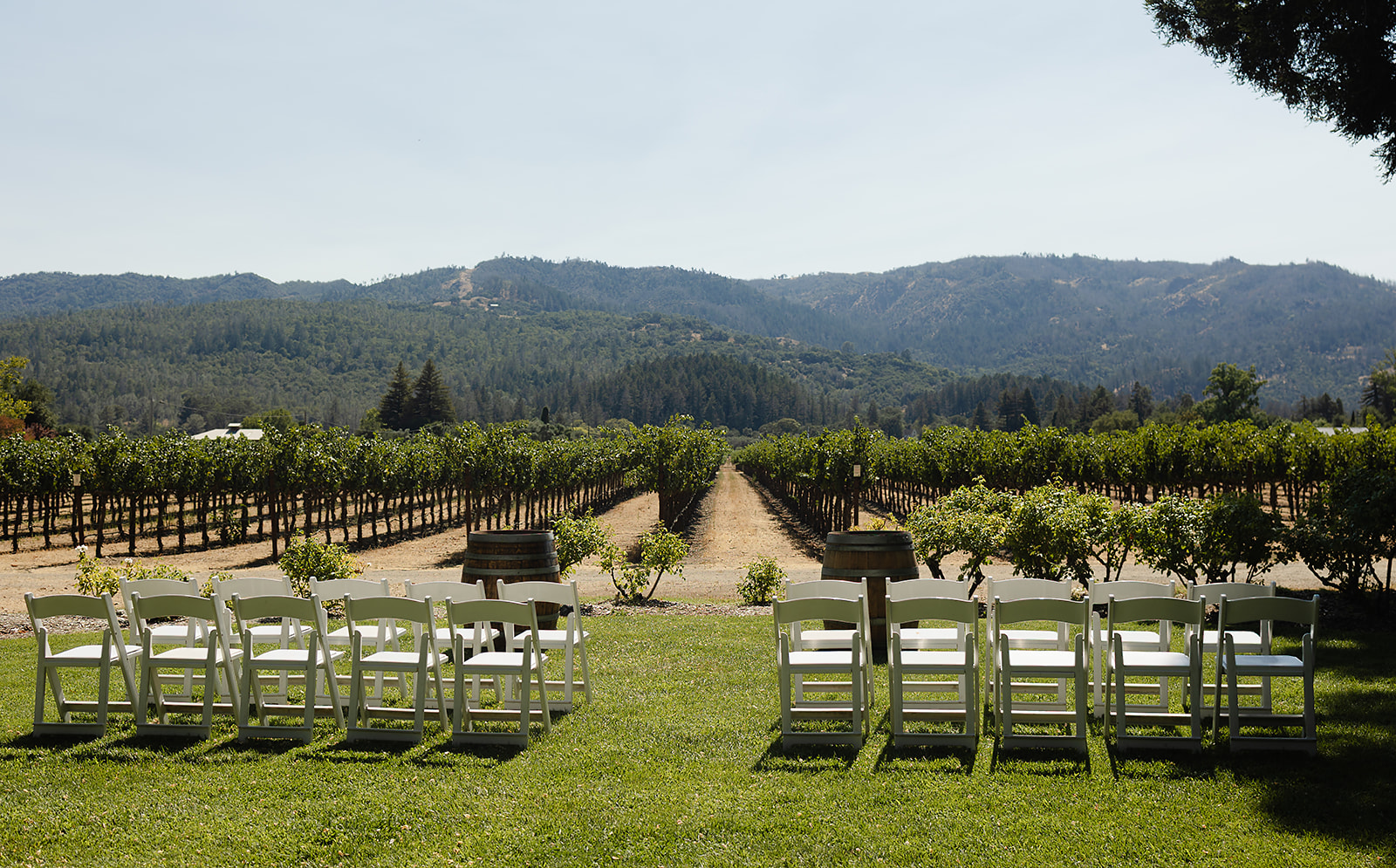 Outdoor ceremony setup surrounded by vineyards at Harvest Inn Napa Valley