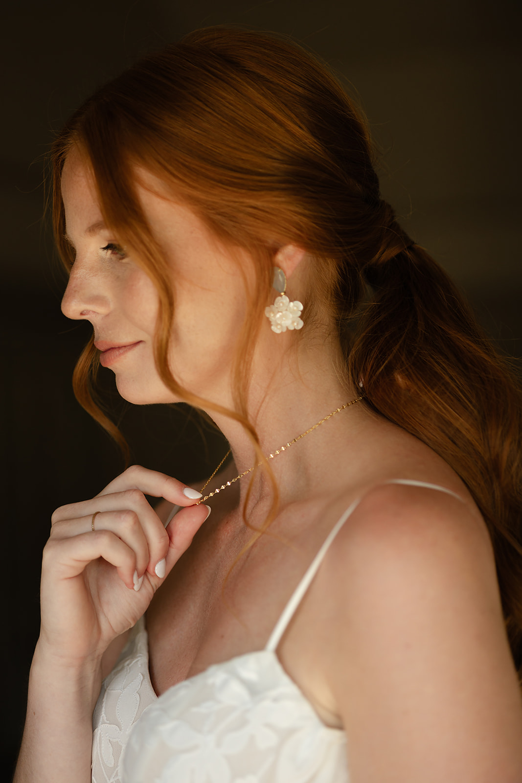 Bride getting ready in natural light at Harvest Inn before intimate wedding