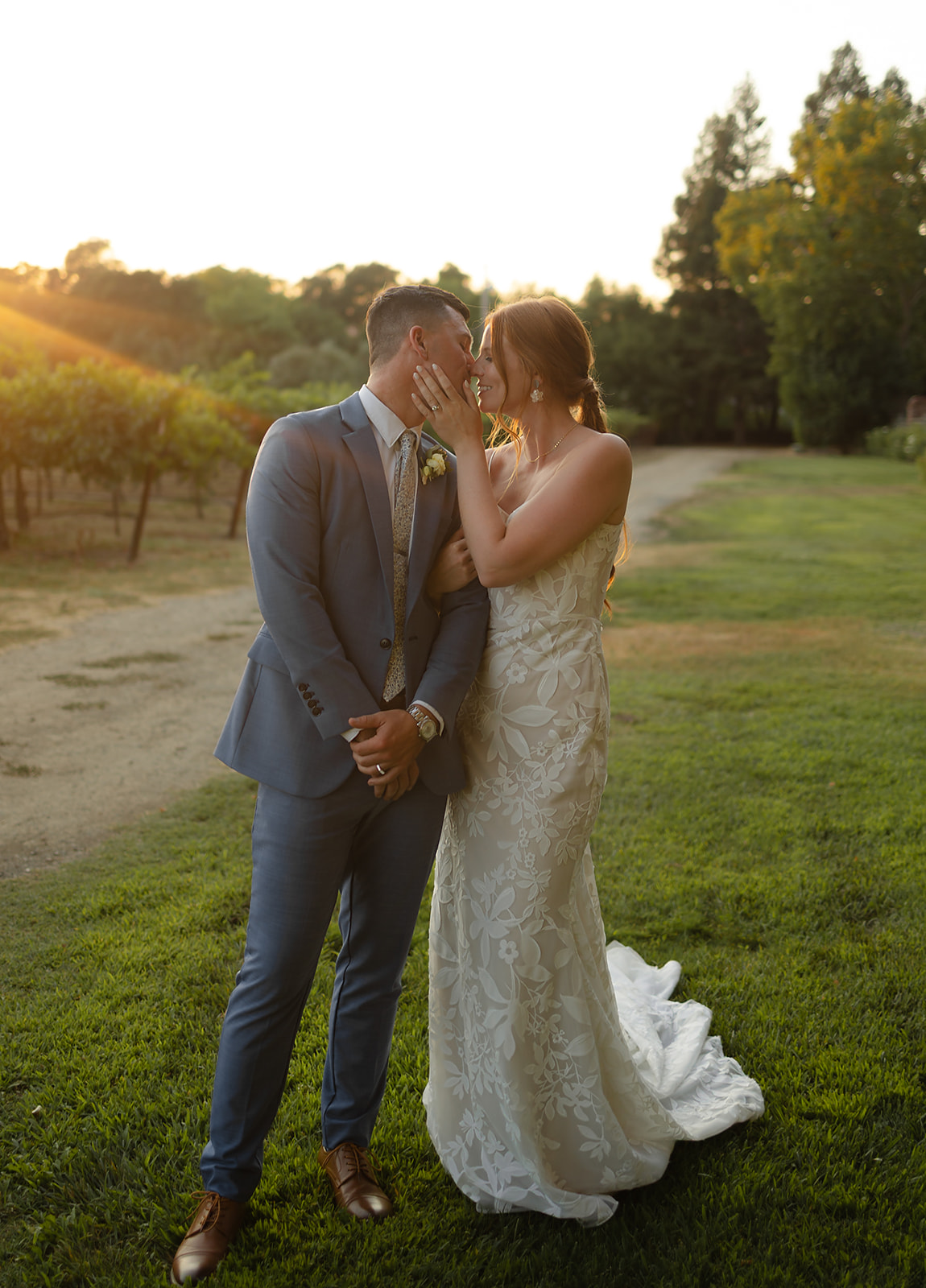 Couple laughing together during sunset portraits in Napa Valley