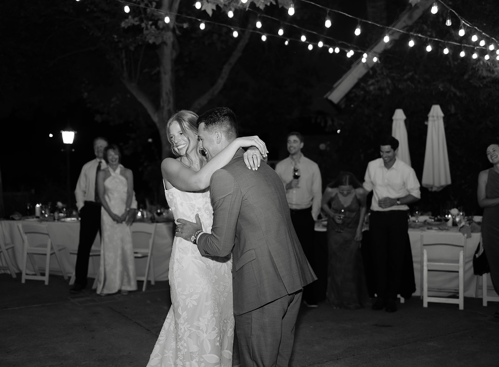 Nighttime outdoor celebration moment at Harvest Inn intimate wedding